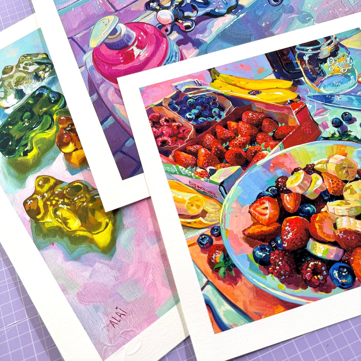 Fine art prints by Alai Ganuza featuring colorful still life oil paintings of fruits, glass objects, and everyday scenes, reproduced on high-quality archival paper.