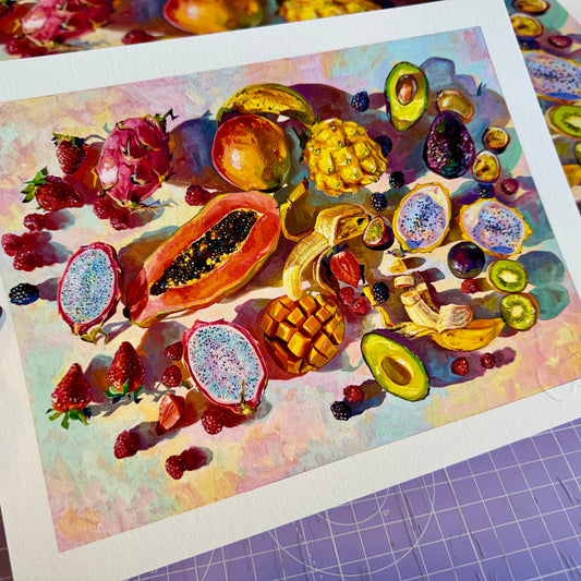 Fine art giclée print by Alai Ganuza featuring a vibrant arrangement of tropical fruits including papaya, pitaya, mango, avocado, and watermelon. High contrast kitchen wall art.