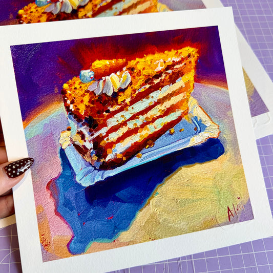 Fine art giclée print by Alai Ganuza featuring a slice of carrot cake with white frosting and a mini carrot decoration on a blue plate. Vibrant food still life for kitchen decor.