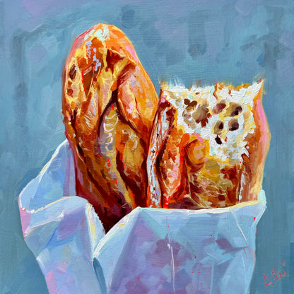 Original oil painting by Alai Ganuza titled "Baguette". Two golden baguettes in a white paper bag, one broken open revealing the airy crumb, set against a slate blue background with impasto texture.