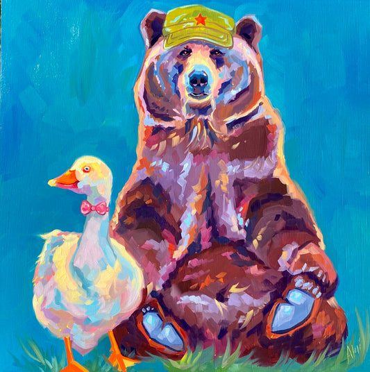 An original 12x12 oil painting of a bear wearing a green cap and a white goose wearing a pink bow. Painted with thick texture and bold colors against a bright blue background.