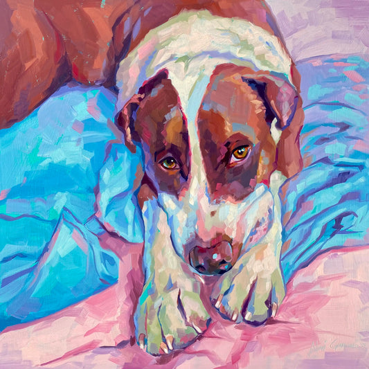 An original 16x16 oil painting of a brown and white dog resting her head between her paws on a bed. Features thick painterly texture and a background of vibrant blue and pink blankets.
