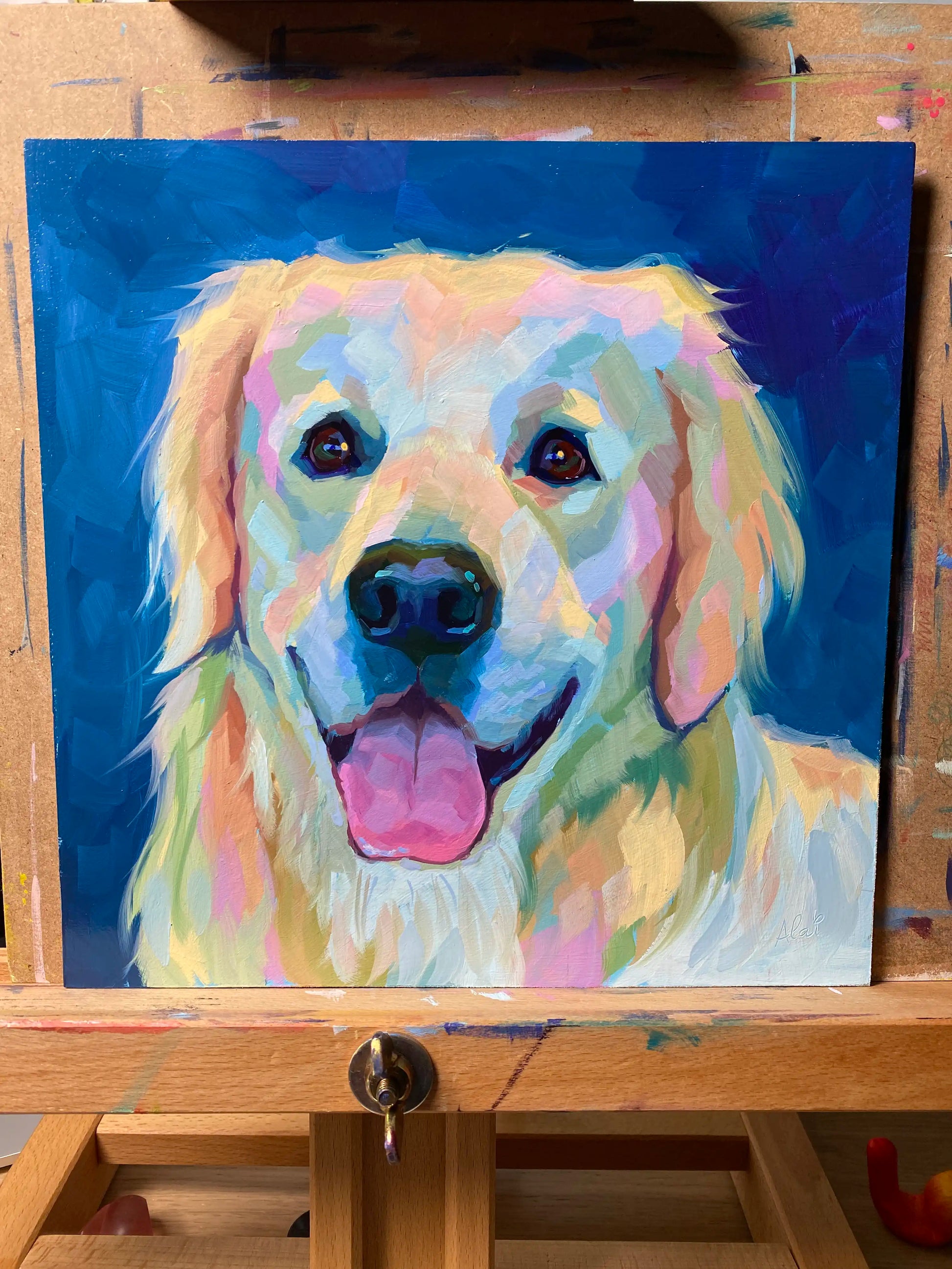 An original 10x10 oil painting of a smiling golden dog named Digby. It features thick painterly texture and vibrant highlights against a deep blue background on a wood panel.
