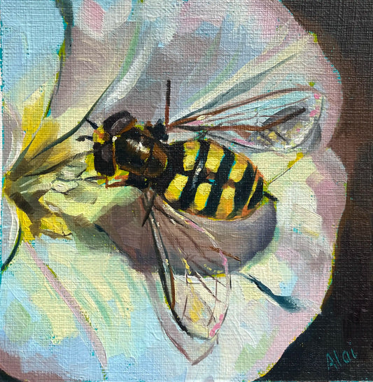 An original oil painting titled Golden Stripe by Alai Ganuza. The macro study depicts a detailed bee with bold black and yellow stripes resting on a light-colored flower petal. The painting features thick, blocky impasto oil brushstrokes on a textured canvas surface, with an iridescent wing and a dark background, signed Alai in the bottom corner.