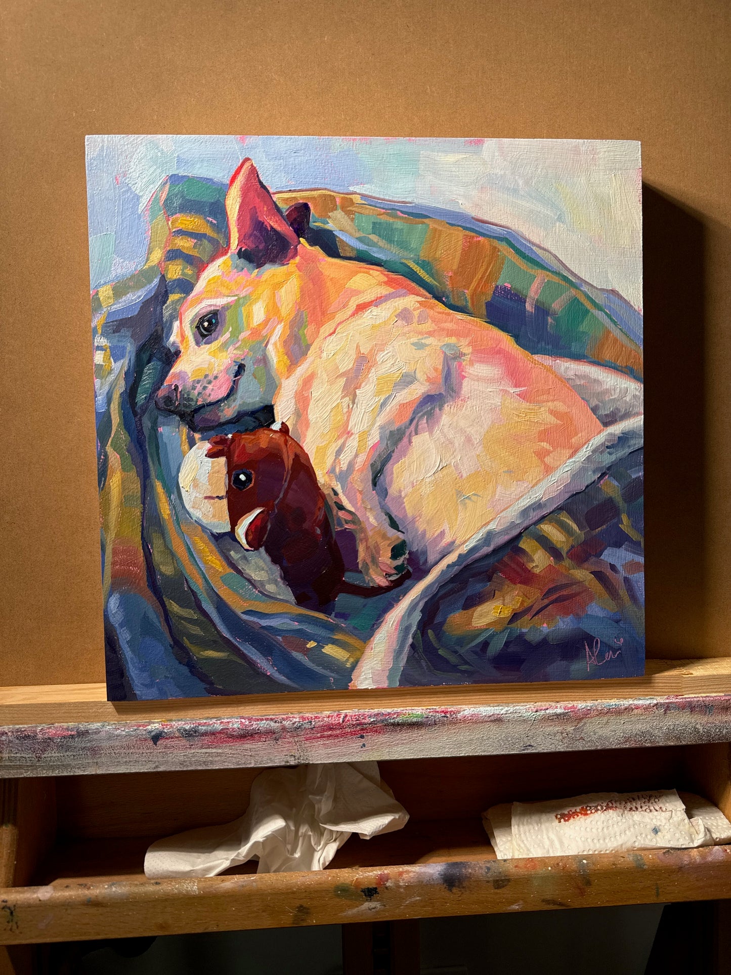 A high-contrast prismatic oil painting of Gus the dog, featuring his signature smirk, thick impasto brushstrokes in vibrant blues and purples, and buttery textures on a 12x12 wood panel.