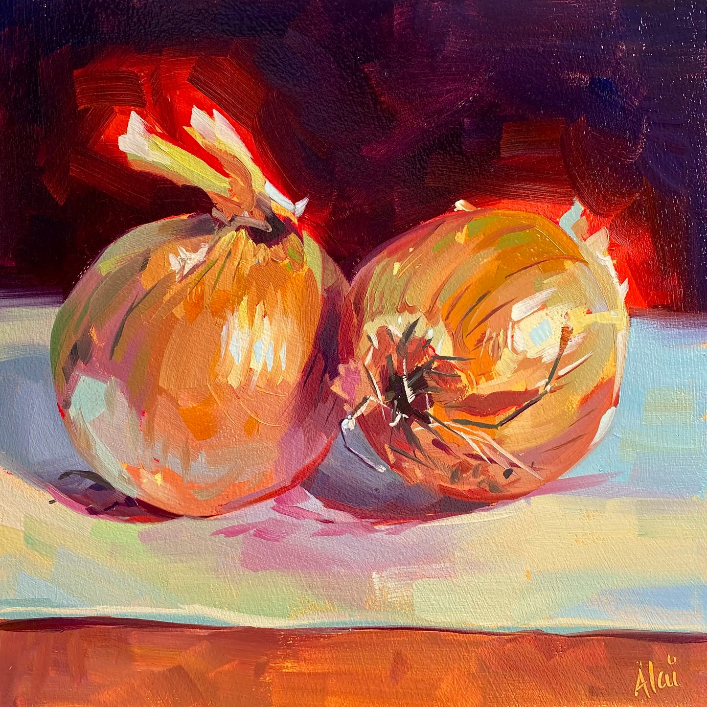Original oil painting by Alai Ganuza titled "Onion Couple". Two yellow onions with golden papery skins sitting side-by-side on a light blue surface against a dark purple background on a square wood panel.