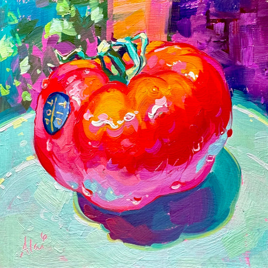 It depicts a vibrant still life study of a single, large red heirloom tomato resting on a pale mint-green plate. The artwork features thick, blocky impasto oil brushstrokes on a square wooden canvas, highlighting rich scarlet and hot pink tones on the glossy skin, a green vine stem, an oval blue sticker, and a dramatic deep purple shadow cast beneath it against a magenta background.