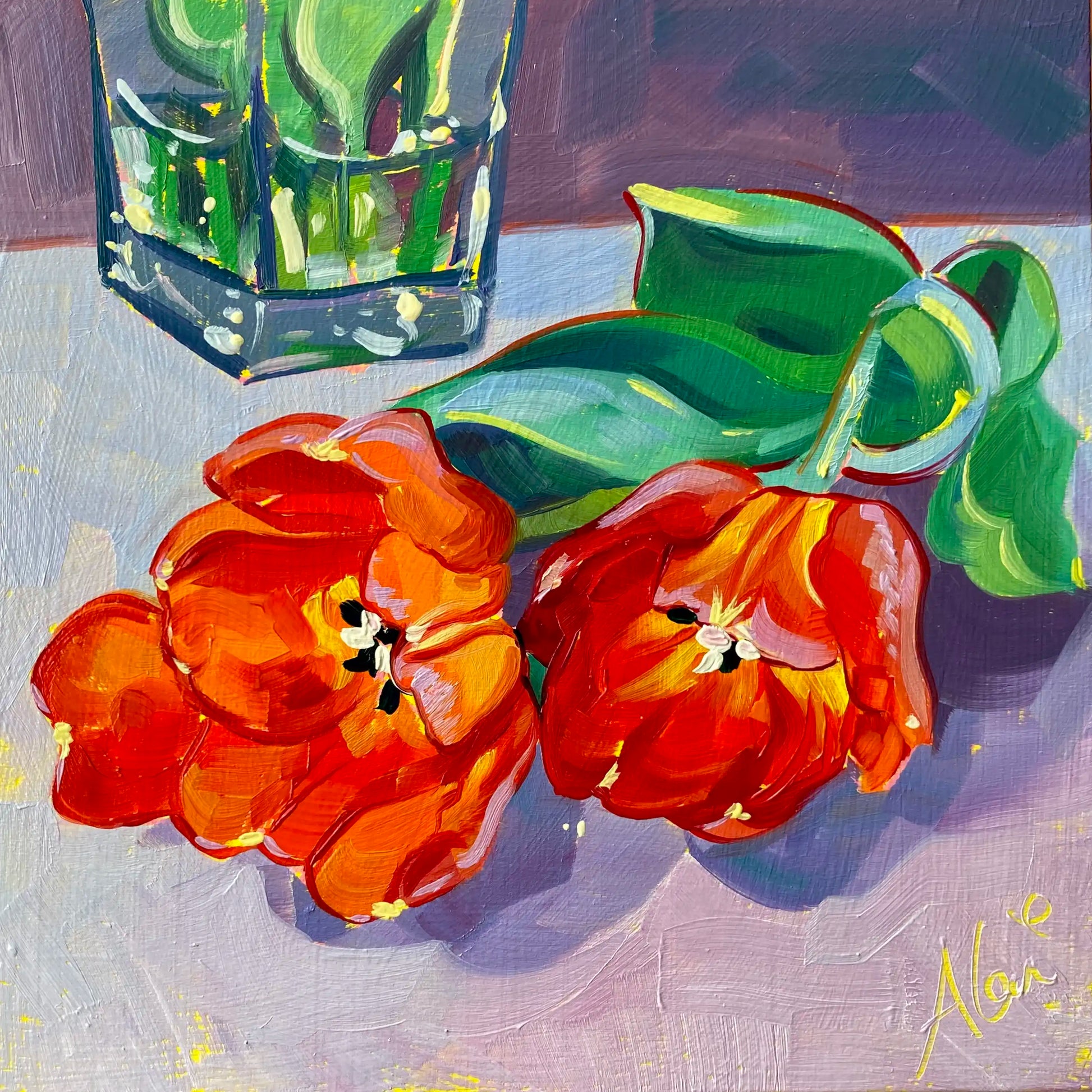 Original oil painting by Alai Ganuza titled "Red Tulips". Two bright red and orange tulips lying on a light purple surface next to the base of a glass vase, painted on a square wood panel.