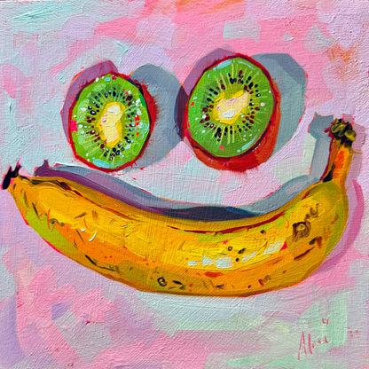 Original oil painting by Alai Ganuza titled "Smily Fruits". A smiling face composition formed by a curved yellow banana and two green and red kiwi halves, painted with thick impasto texture against a pink and lilac background.