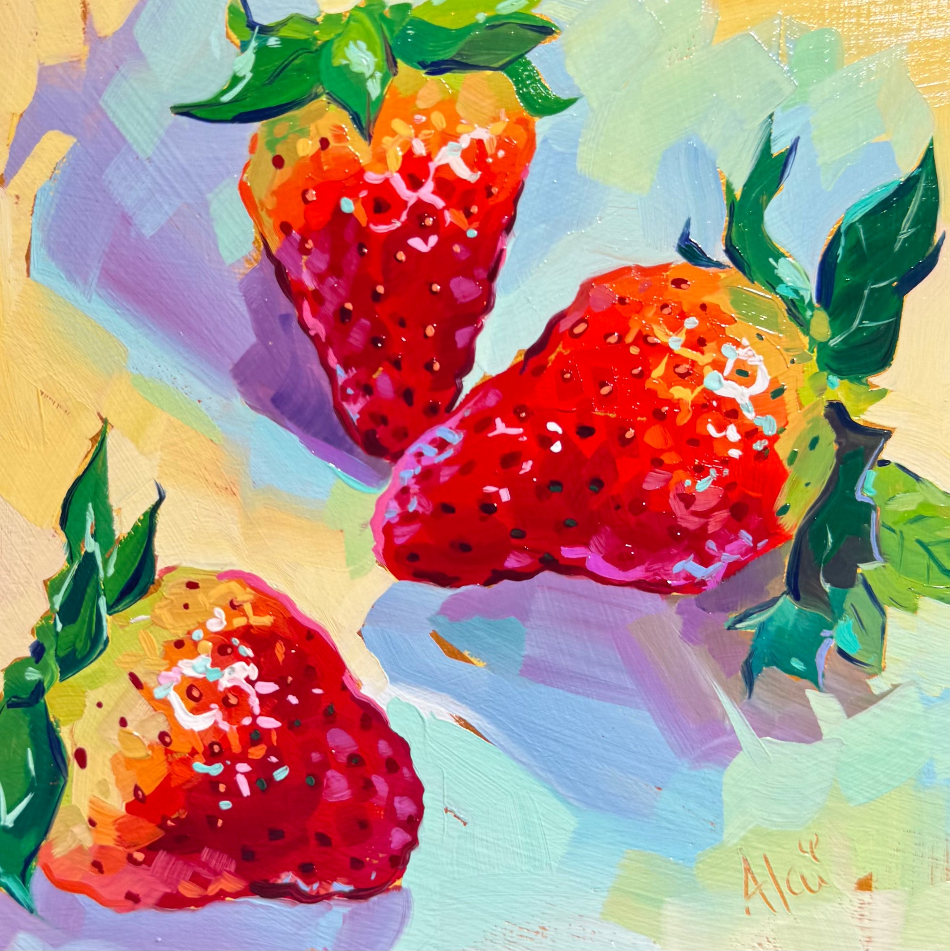 A square 15x15 cm original oil painting featuring three ripe strawberries scattered across a light, warm yellow and mint green background. The strawberries are rendered in deep reds and fiery oranges with bright neon pink and white highlights that simulate the reflection of light on their seeds. Each fruit has a crown of vibrant, dark green leaves painted with thick, directional brushstrokes. Deep lavender and periwinkle shadows are cast diagonally, creating a sense of height and volume. 