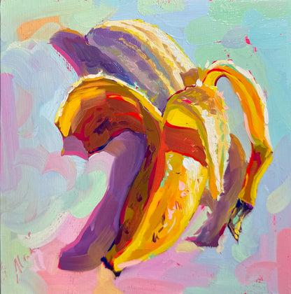 An expressive oil painting of a banana with its peel curling downward. The artwork uses bold, visible brushstrokes with a rich palette of bright yellows, deep purples, warm browns, and hints of red and pink. The background is a soft, dreamlike wash of pastel blue, mint green, and light pink, giving the scene a bright, sunny atmosphere. A subtle artist signature is visible in the bottom left corner.