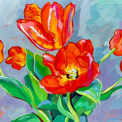 Original oil painting by Alai Ganuza titled "Tulips". A cluster of bright orange and red tulips, one fully open showing the center, painted with thick impasto texture against a blue-grey background.