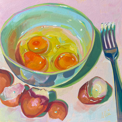 Original oil painting by Alai Ganuza titled "About to scramble eggs". A light teal bowl with three bright orange egg yolks, surrounded by broken brown eggshells and a dark fork, rendered in thick impasto on a pink background.