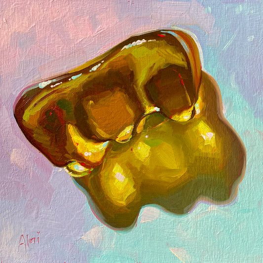 Original oil painting by Alai Ganuza titled "Sweet Life: Yellow". A large, glossy yellow gummy bear candy, rendered with translucent textures and glowing golden light, on a pastel pink and blue background.