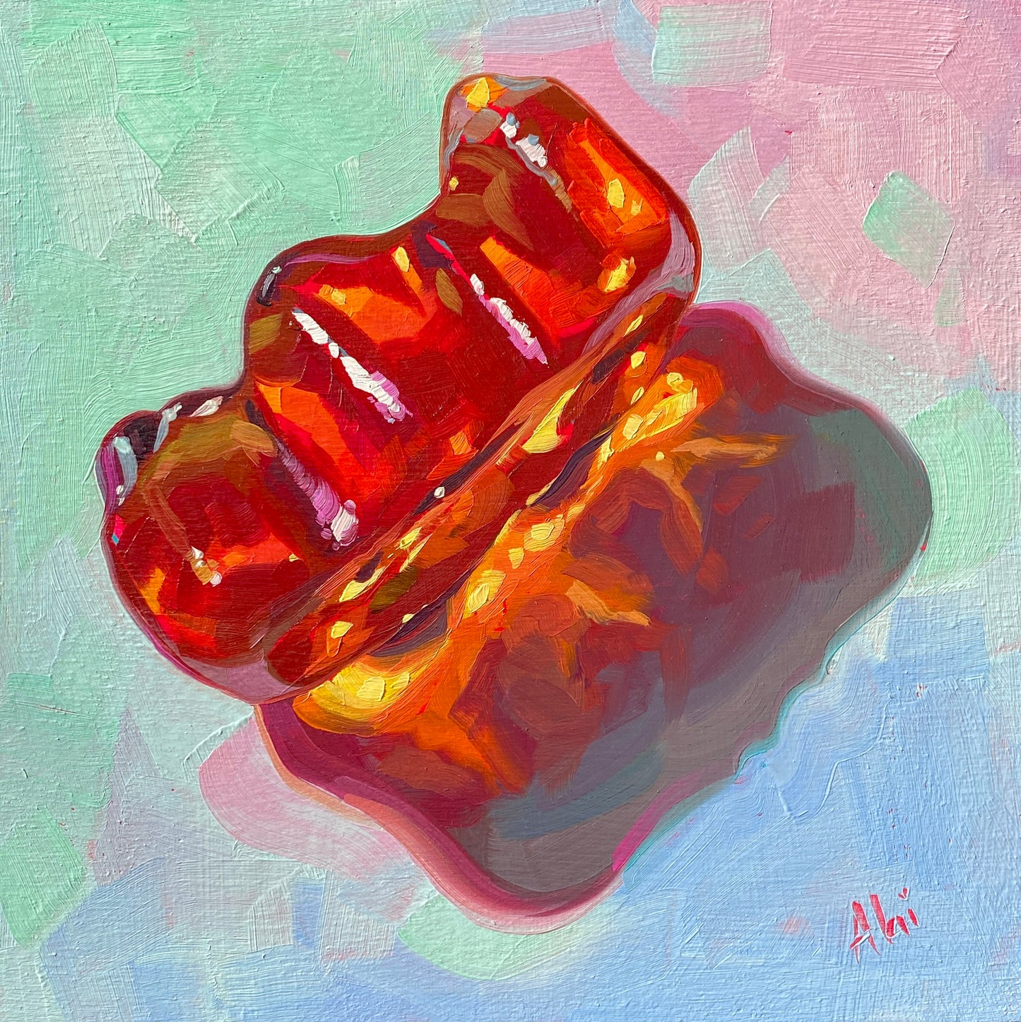 Original oil painting by Alai Ganuza titled "Sweet Life: Red". A large, glossy red gummy bear candy lying on its back, rendered with translucent textures and casting a warm shadow on a pastel blue and pink background.