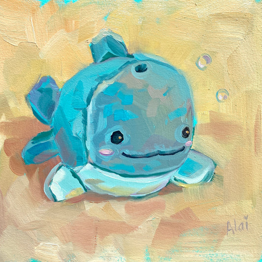 Original oil painting by Alai Ganuza titled "Dolphin plushie". A cute teal and blue dolphin toy with big black eyes and pink blush, rendered in thick impasto on a sandy yellow background with floating bubbles.