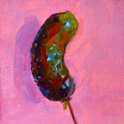 Original oil painting by Alai Ganuza titled "Pickle". A single green pickle on a stick, rendered with thick, colorful brushstrokes, set against a bright pink background on a square wood panel.