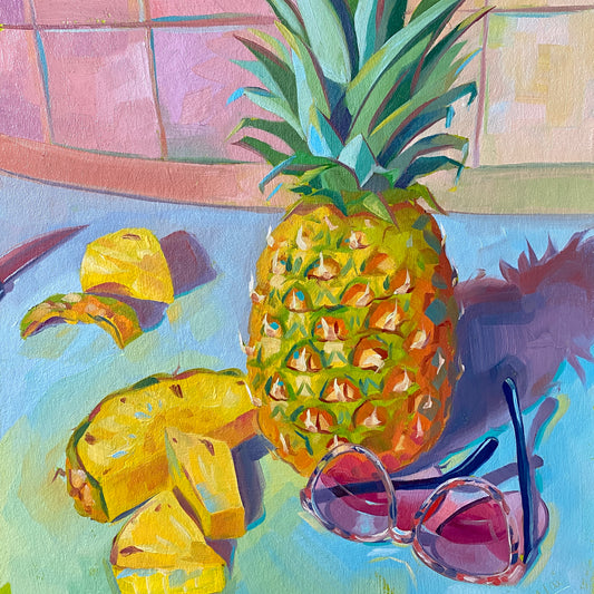 Original oil painting by Alai Ganuza titled "Pineapple and sunglasses". A whole pineapple, several sliced wedges, and pink-rimmed sunglasses rendered in thick impasto on a teal surface against a pink tiled background.
