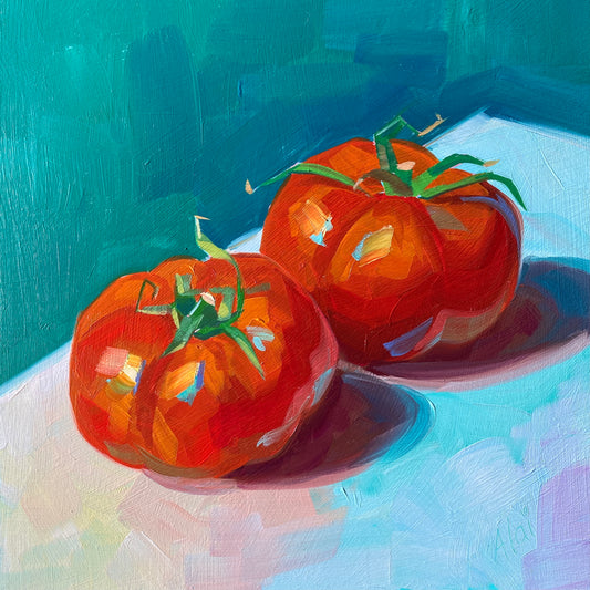 Original oil painting by Alai Ganuza titled "Tomatoes". Two bright red tomatoes with green stems rendered in thick impasto, featuring electric blue highlights and casting deep purple shadows against a teal and light blue background.