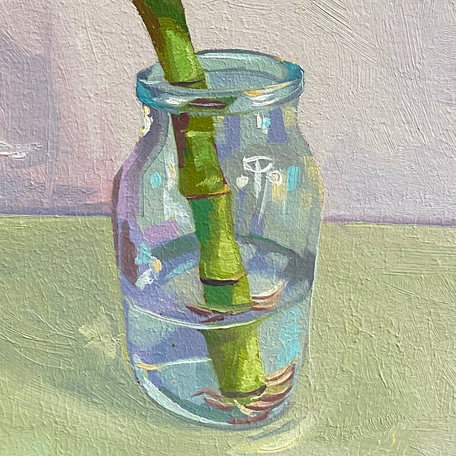 Original oil painting by Alai Ganuza titled "Bamboo in a jar". A single green bamboo stalk in a clear glass jar partially filled with water, featuring vibrant prismatic reflections, rendered in thick impasto against a soft lavender background.
