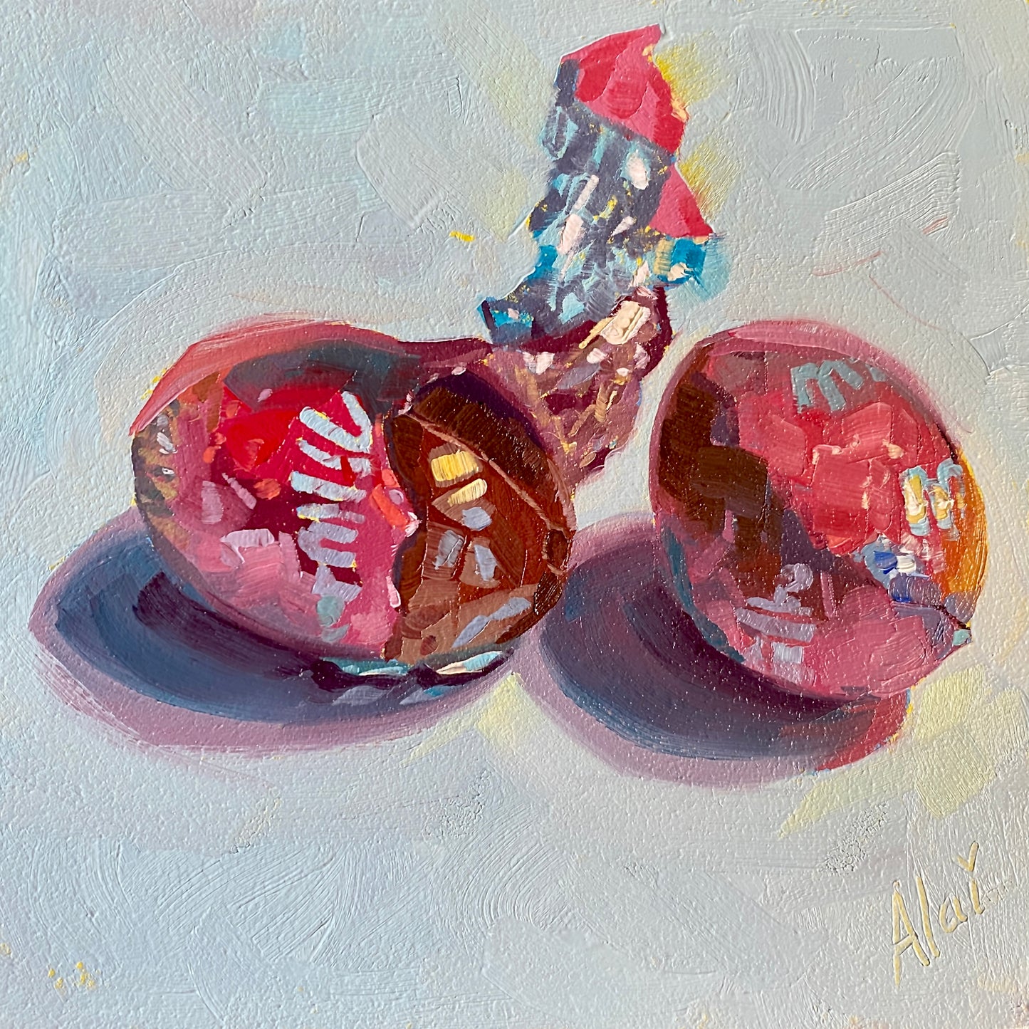 Original oil painting by Alai Ganuza titled "Easter chocolate eggs". Two chocolate eggs, one partially unwrapped with colorful red and blue foil, rendered in thick impasto with vibrant pink and prismatic reflections on a light background.