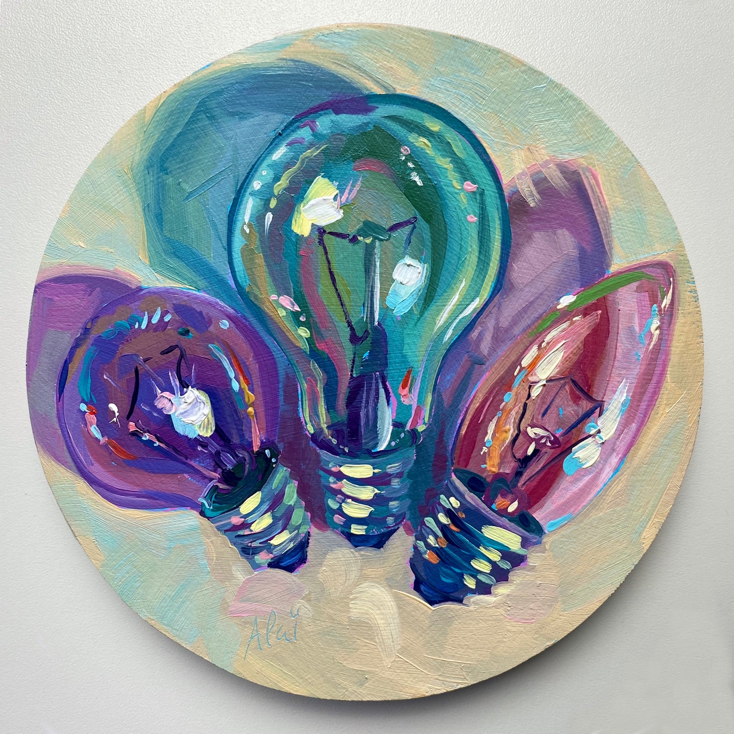 Original oil painting by Alai Ganuza titled "Colorful Lightbulbs". Three stylized lightbulbs in teal, purple, and pink rendered in thick impasto on a circular wood panel.