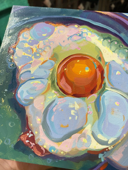 Huevo sobre pintura al óleo de oro