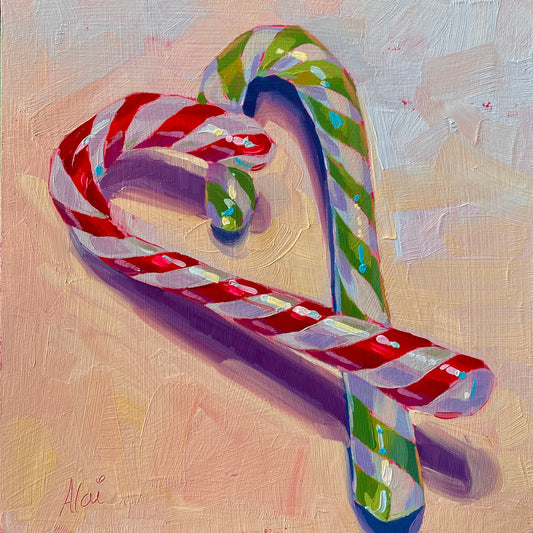 Original oil painting by Alai Ganuza titled "Candy Cane Christmas". Two candy canes—one red and white, the other green and white—forming a heart shape in thick impasto with cyan highlights and deep purple shadows on a cream background.
