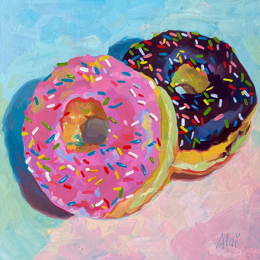 Original oil painting by Alai Ganuza titled "Donuts II". Two donuts, one with pink glaze and one with dark chocolate glaze, both covered in multi-colored sprinkles, rendered in thick impasto on a textured pastel background.