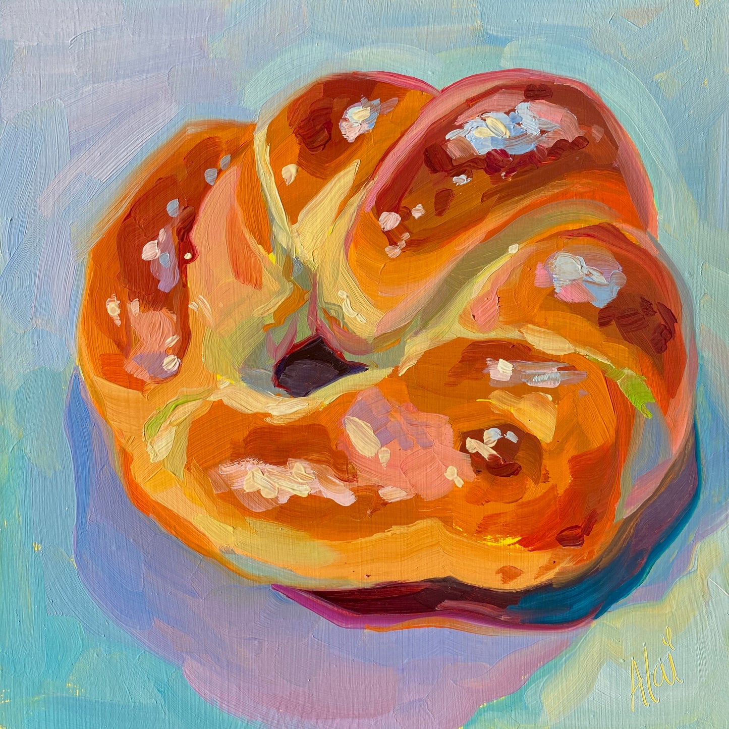 Original oil painting by Alai Ganuza titled "Croissant". A warm, golden-orange croissant rendered in thick impasto with light blue and pink highlights on a vibrant sky-blue and lavender background with a magenta shadow.