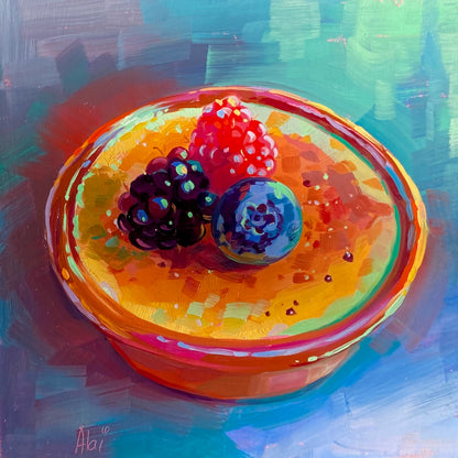 Original oil painting by Alai Ganuza titled "Créeme Brûlée". A terracotta ramekin filled with golden caramelized crème brûlée topped with a raspberry, blackberry, and blueberry, painted against a teal and blue background.