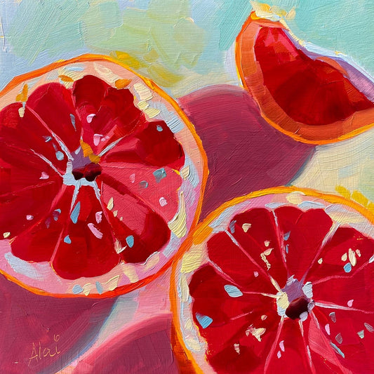 Original oil painting by Alai Ganuza titled "Grapefruits II". Three grapefruit slices with deep red interiors and orange rinds, rendered in thick impasto against a light blue and magenta background with saturated shadows.