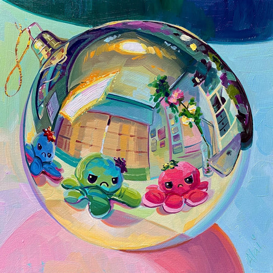 Original oil painting by Alai Ganuza titled "Christmas ball and grumpy family". A reflective silver ornament showing a room reflection, surrounded by three grumpy reversible octopus plushies in blue, green, and pink, rendered in thick impasto.