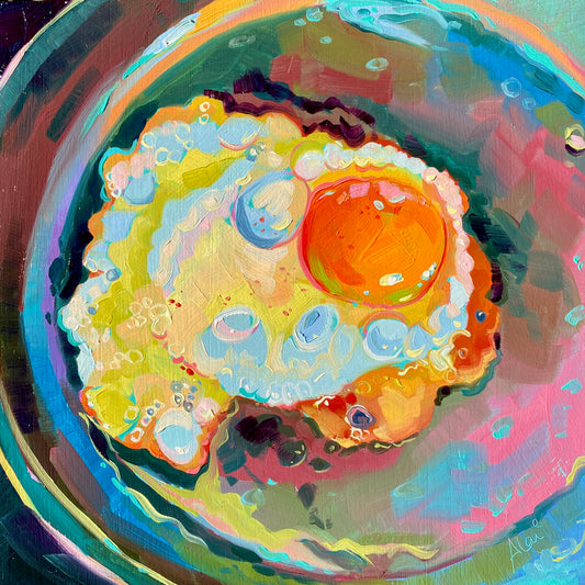 Original oil painting by Alai Ganuza titled "Frying egg". A close-up of a fried egg sizzling in a pan with a vibrant orange yolk and thick impasto whites featuring blue and yellow highlights against a dark teal and magenta background.