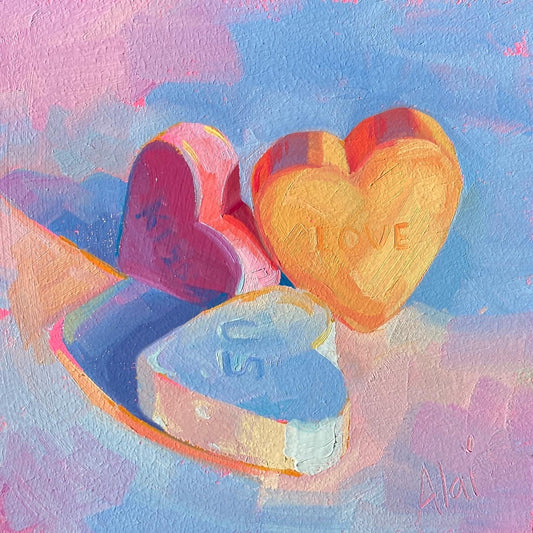 Original oil painting by Alai Ganuza titled "Candy hearts". Three conversation hearts in pink, orange, and light blue with the words "KISS", "LOVE", and "US" rendered in thick impasto against a textured lavender and blue background.