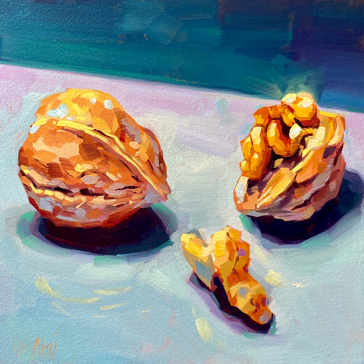Original oil painting by Alai Ganuza titled "Walnuts". A still life composition featuring a whole walnut, a cracked walnut revealing the kernel, and a loose nut piece, painted in warm ochres against a cool blue and lavender background.