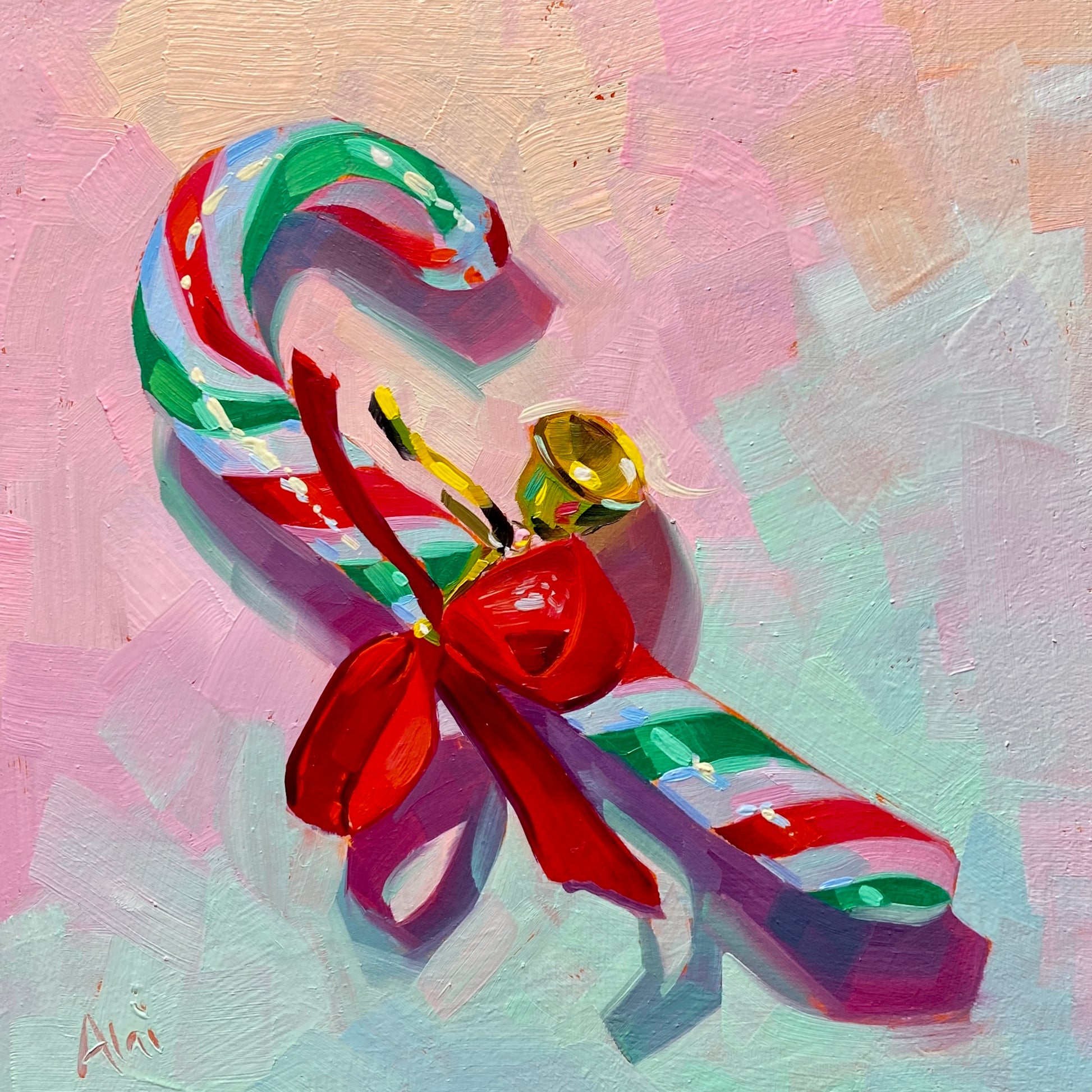 Original oil painting by Alai Ganuza titled "Candy Cane". A classic red, green, and white striped candy cane tied with a bright red ribbon bow and a small gold bell, painted on a pastel pink background.